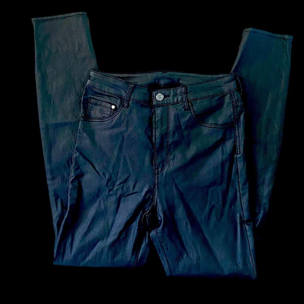 Coated black high waisted jeans